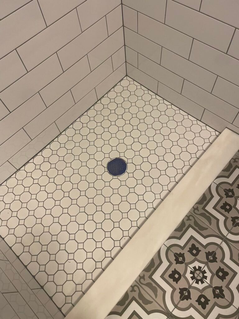 Tiled shower floor with drain